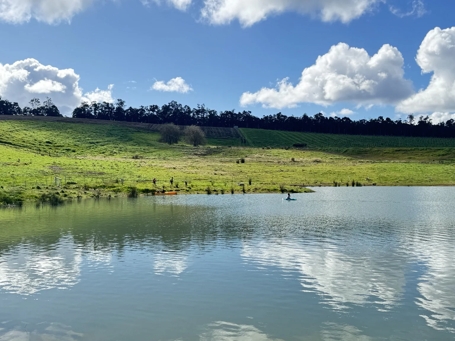 Haiku Hills dam and surrounding farm landscape